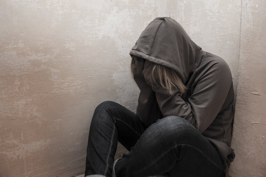 Photo of Young Drug Addict Wearing Hood 